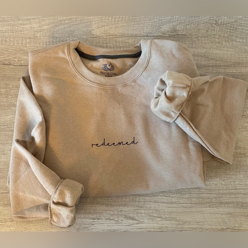 “Redeemed” who God says you are sweatshirt